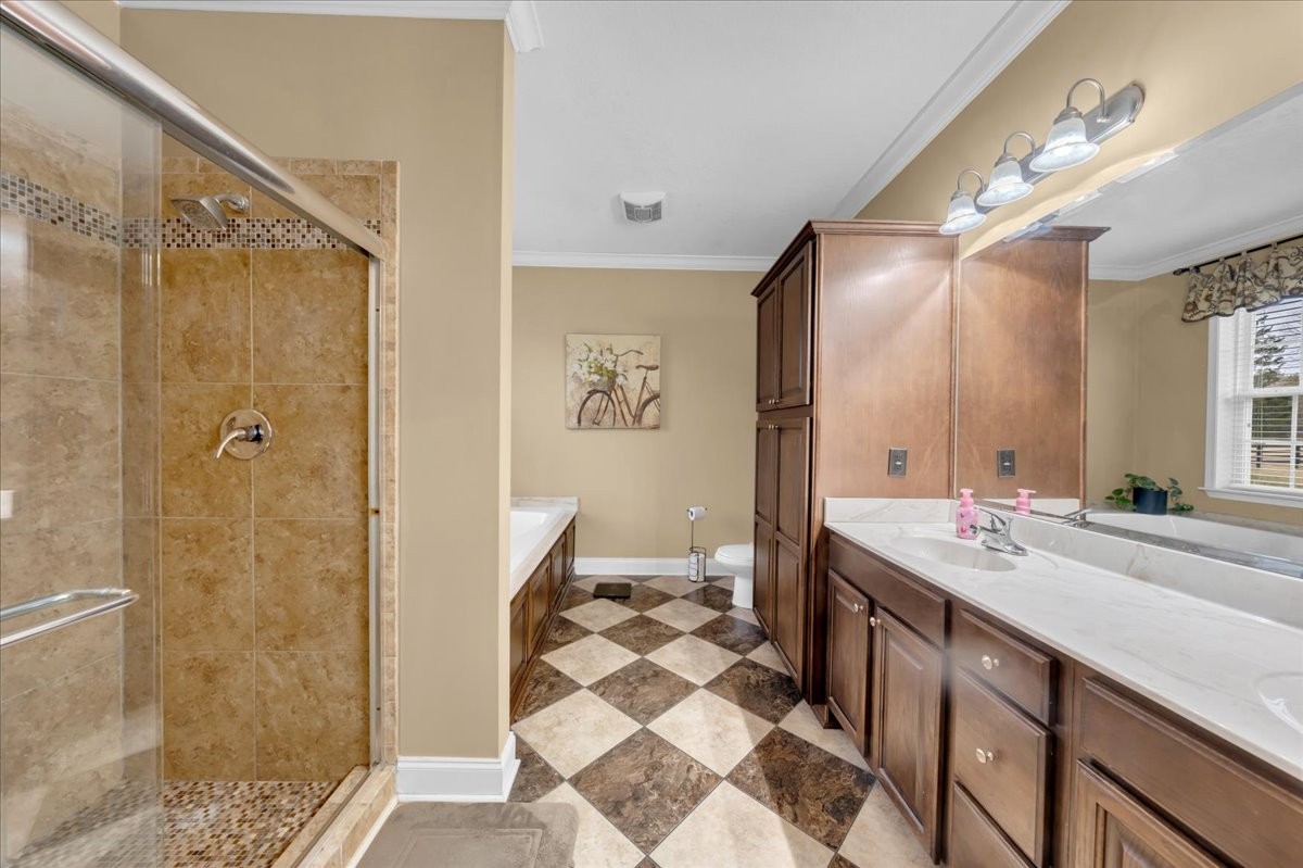 1798 Holly Grove Road Lewisburg, TN 37091 - Photo 25 of 55 a spacious bathroom with a sink mirror and a shower