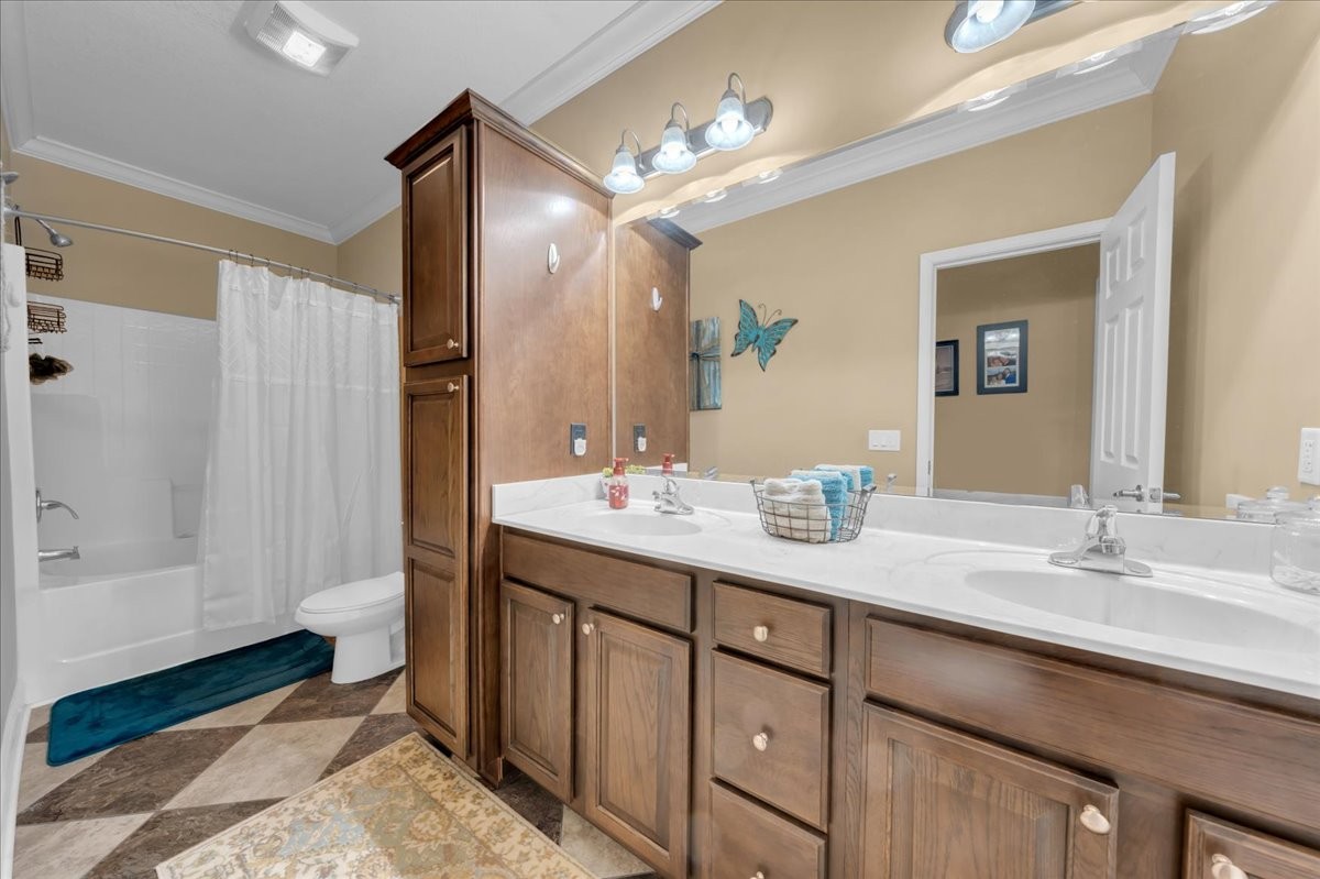 1798 Holly Grove Road Lewisburg, TN 37091 - Photo 28 of 55 a bathroom with a double vanity sink and a mirror