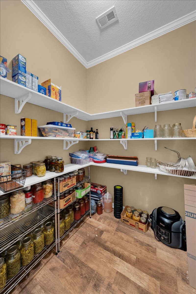 1798 Holly Grove Road Lewisburg, TN 37091 - Photo 32 of 55 a view of storage and utility room with racks on the wall