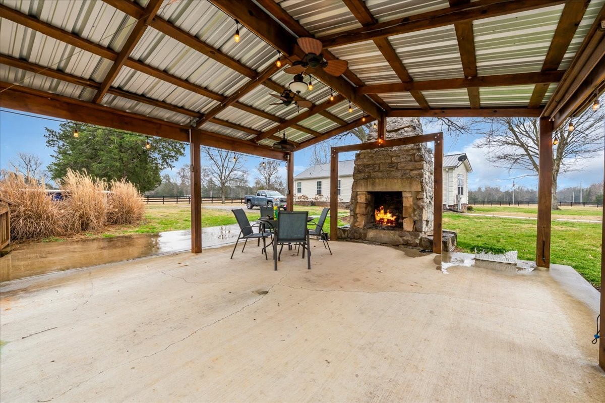 1798 Holly Grove Road Lewisburg, TN 37091 - Photo 33 of 55 a view of a porch with furniture and a fireplace
