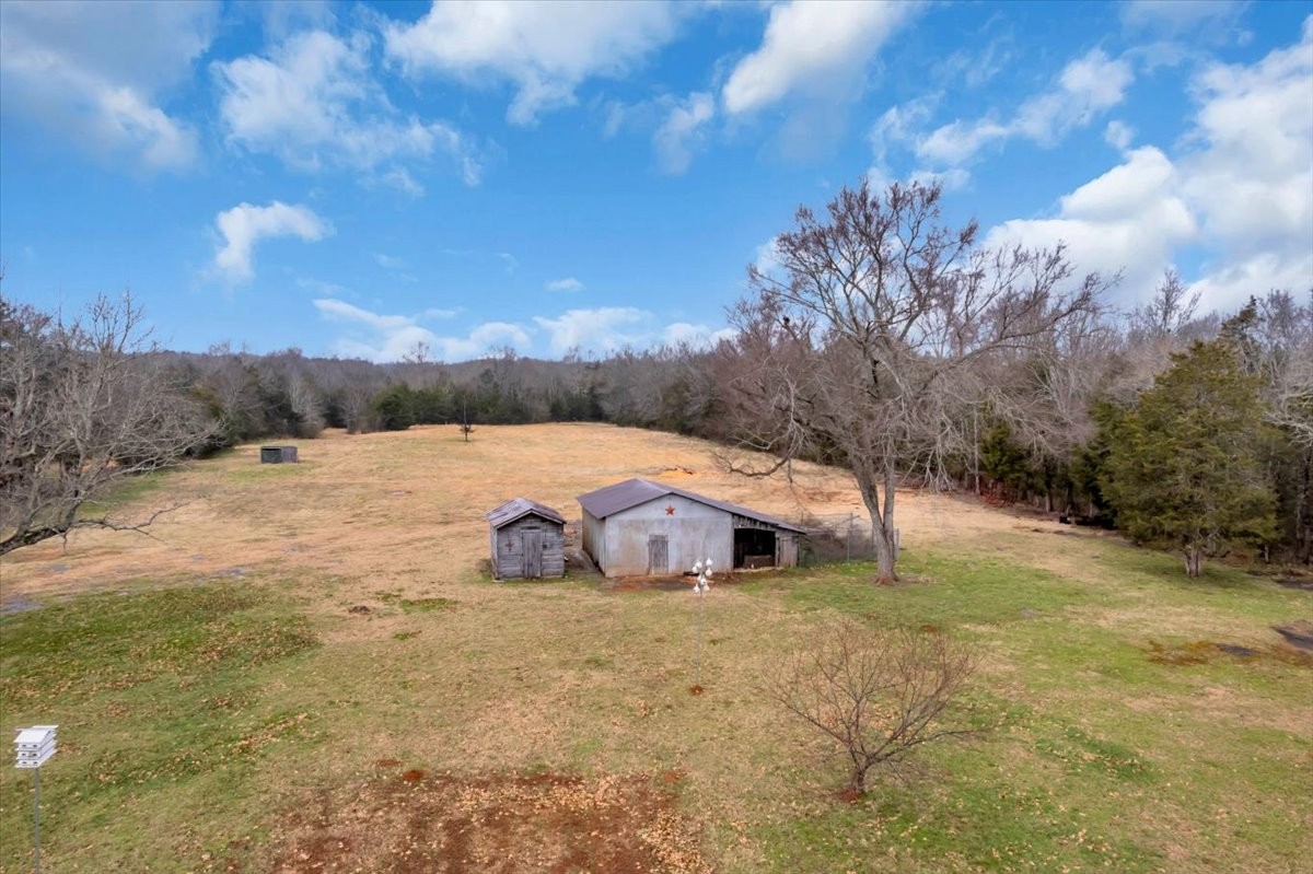 1798 Holly Grove Road Lewisburg, TN 37091 - Photo 45 of 55 a view of a lake with a mountain in the background
