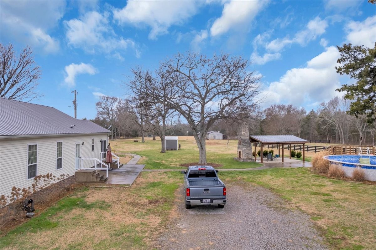 1798 Holly Grove Road Lewisburg, TN 37091 - Photo 50 of 55 a view of a house with backyard and furniture