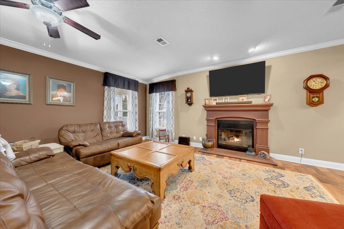 1798 Holly Grove Road Lewisburg, TN 37091 - Photo 9 of 55 a living room with fireplace furniture and a flat screen tv