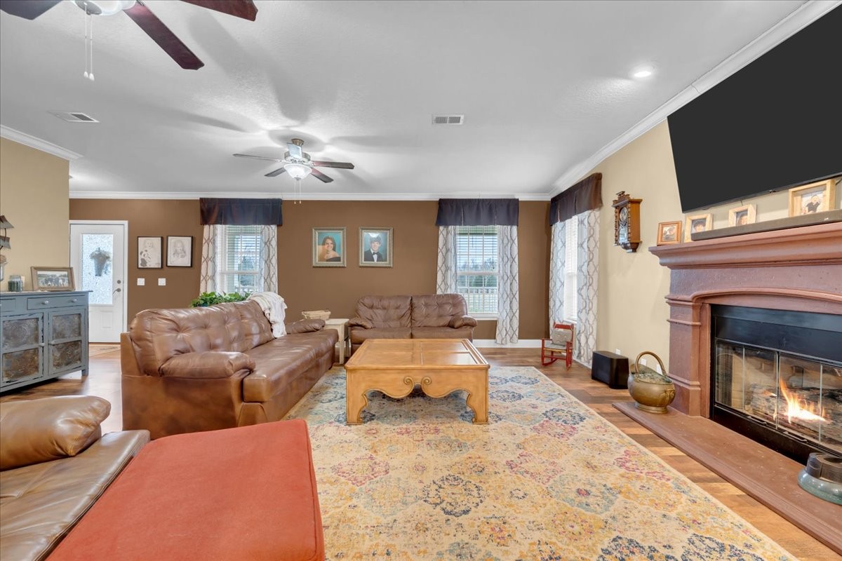 1798 Holly Grove Road Lewisburg, TN 37091 - Photo 10 of 55 a bedroom with furniture and a fireplace