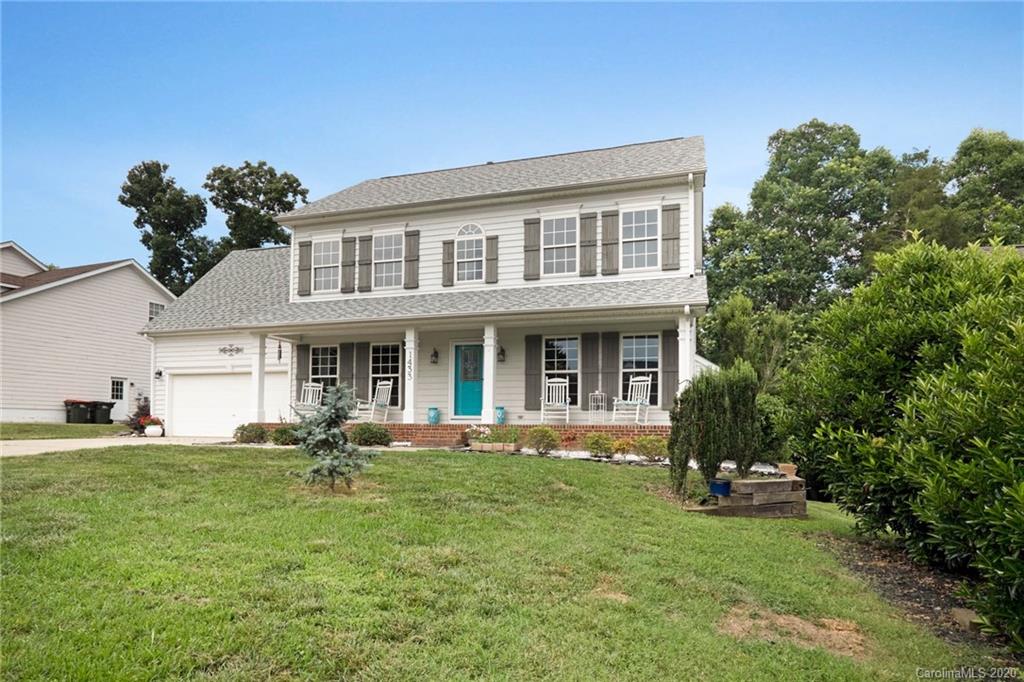 1433 Autumn Ridge Lane Fort Mill, SC 29708 - Photo 2 of 38 a front view of a house with a yard