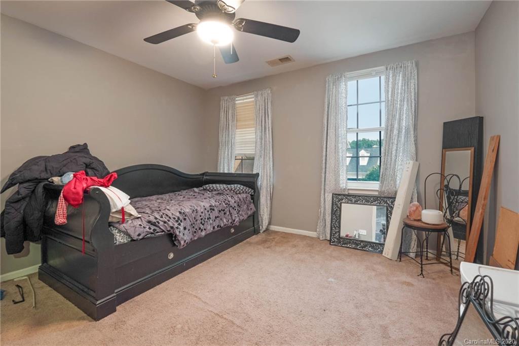 1433 Autumn Ridge Lane Fort Mill, SC 29708 - Photo 29 of 38 a bedroom with a bed and a window
