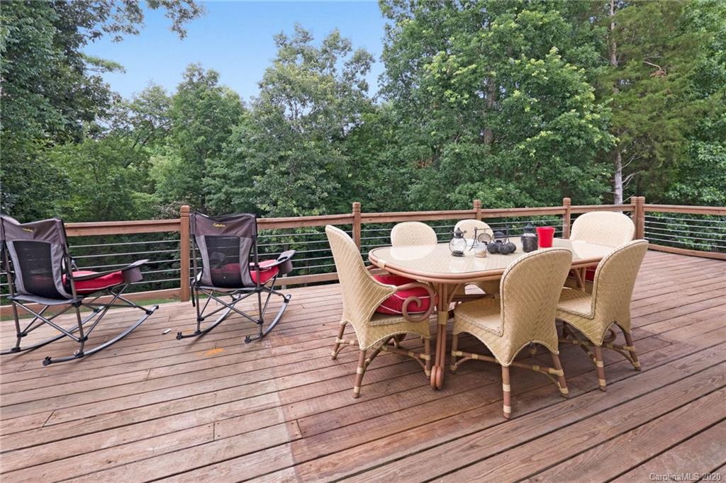 1433 Autumn Ridge Lane Fort Mill, SC 29708 - Photo 30 of 38 a patio with wooden floor and outdoor seating