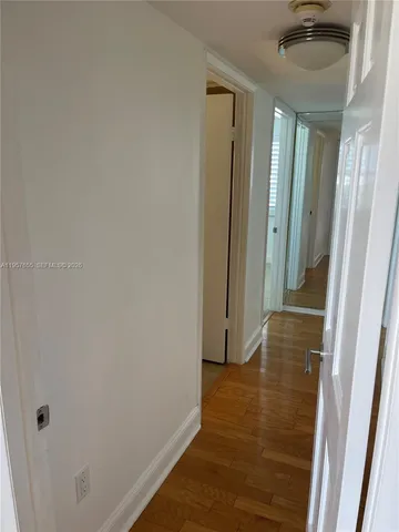 a view of hallway with shower