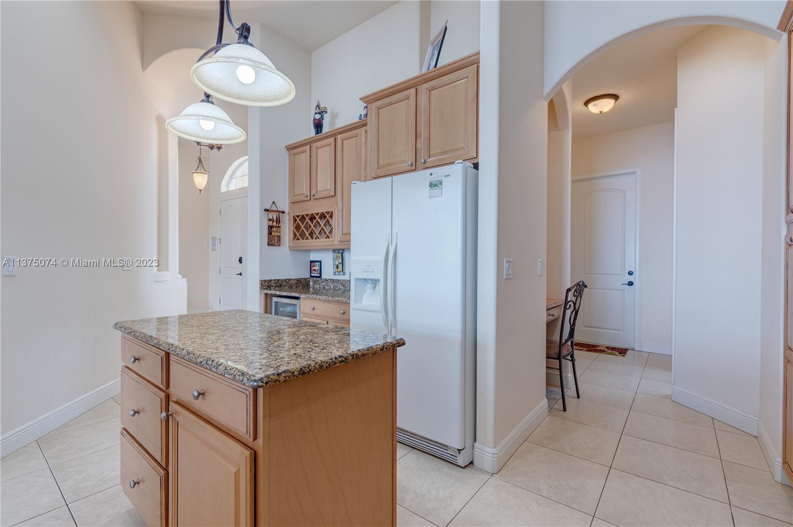 258 Bimini Road Cocoa Beach, FL 32931 - Photo 15 of 43 a kitchen with cabinets appliances and a counter top space