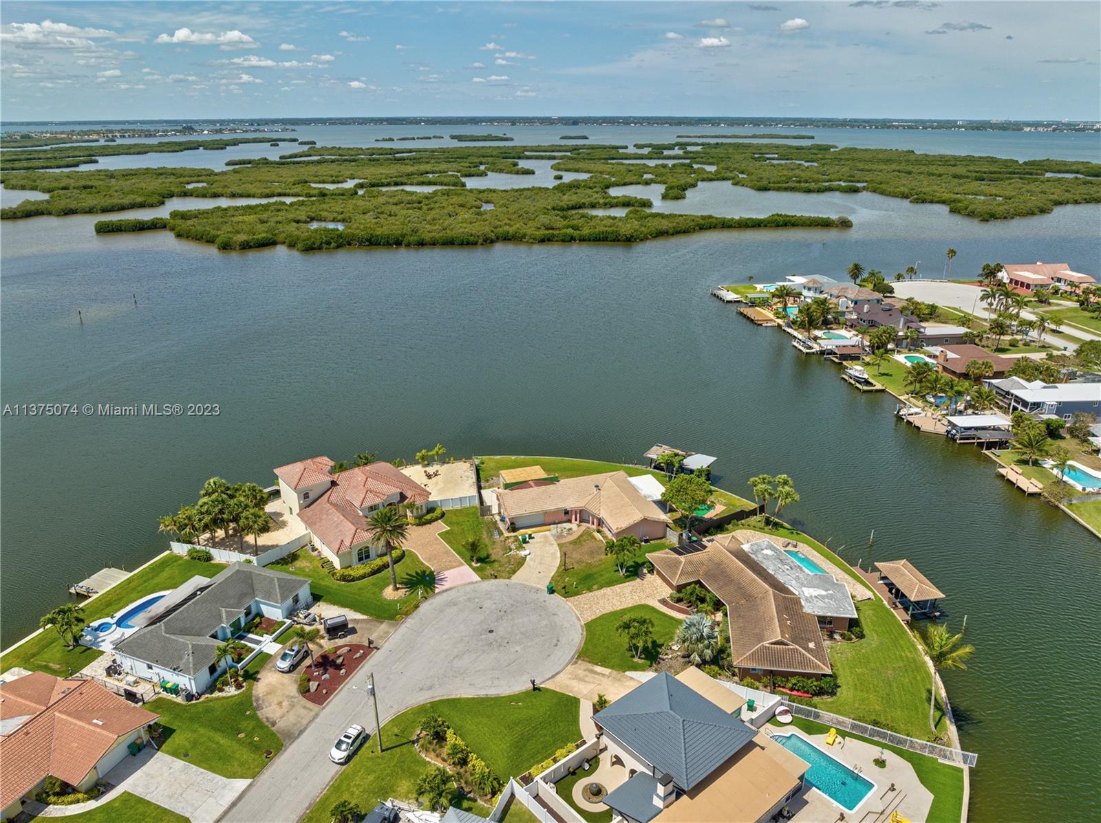 258 Bimini Road Cocoa Beach, FL 32931 - Photo 36 of 43 a view of an ocean and a building