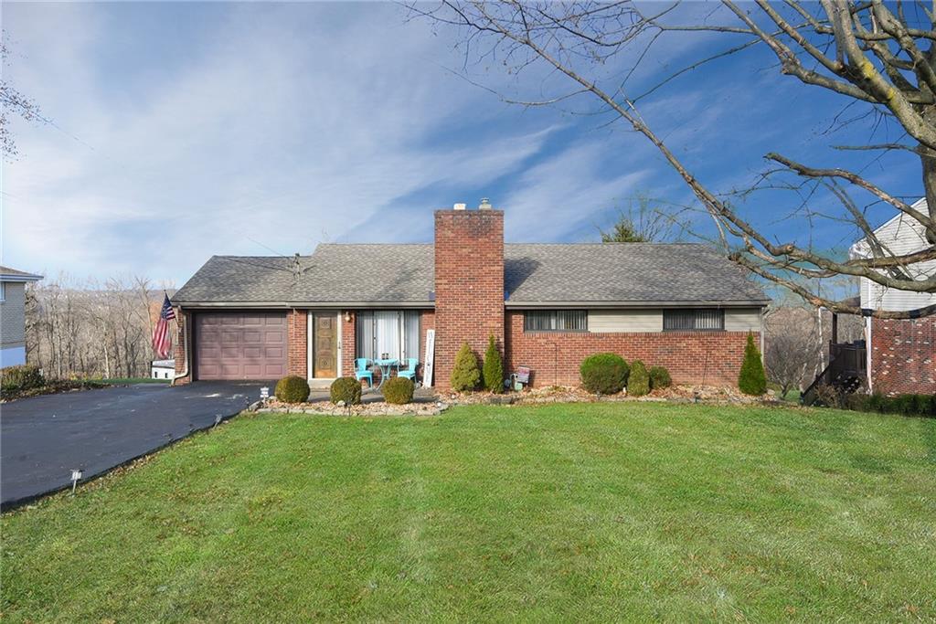10 Bellview Drive McKees Rocks, PA 15136 - Photo 1 of 25 a view of a house with a yard and sitting area