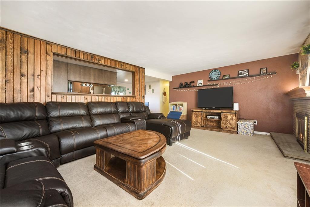 10 Bellview Drive McKees Rocks, PA 15136 - Photo 2 of 25 a living room with furniture and a flat screen tv