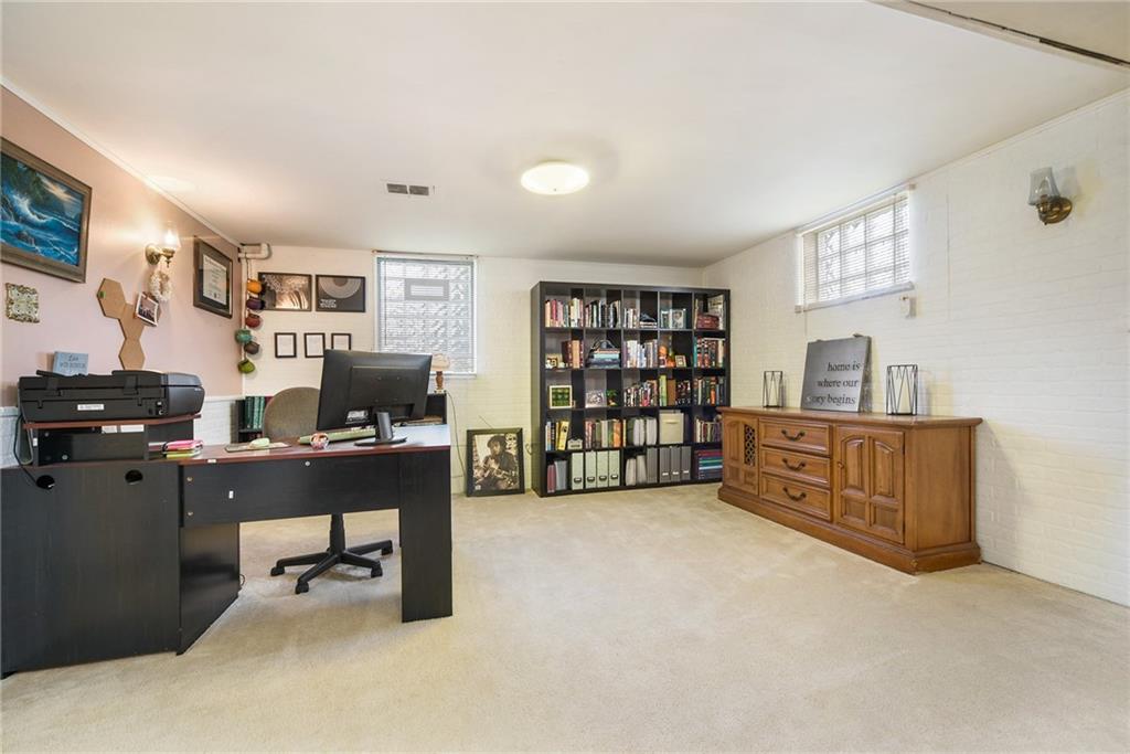 10 Bellview Drive McKees Rocks, PA 15136 - Photo 21 of 25 a workspace with furniture and bookshelf