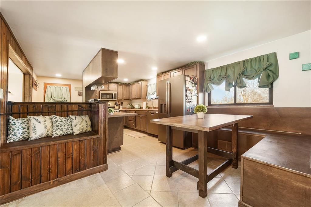 10 Bellview Drive McKees Rocks, PA 15136 - Photo 8 of 25 a view of a dining room with furniture and window