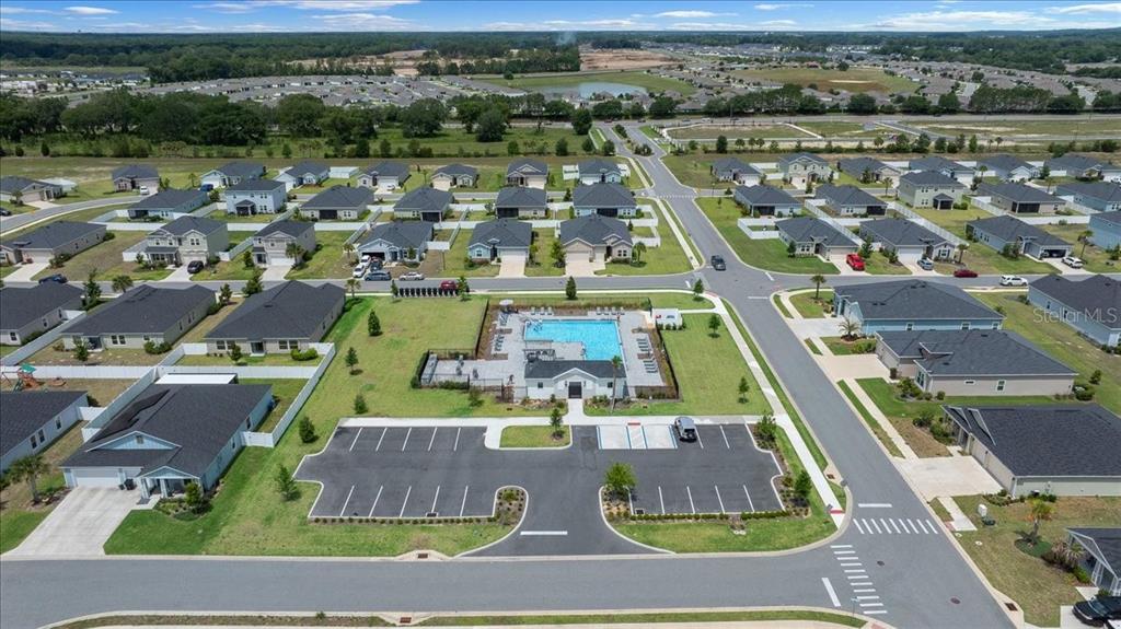 9329 Southwest 57th Terrace Ocala, FL 34476 - Photo 53 of 64 an aerial view of a tennis ground