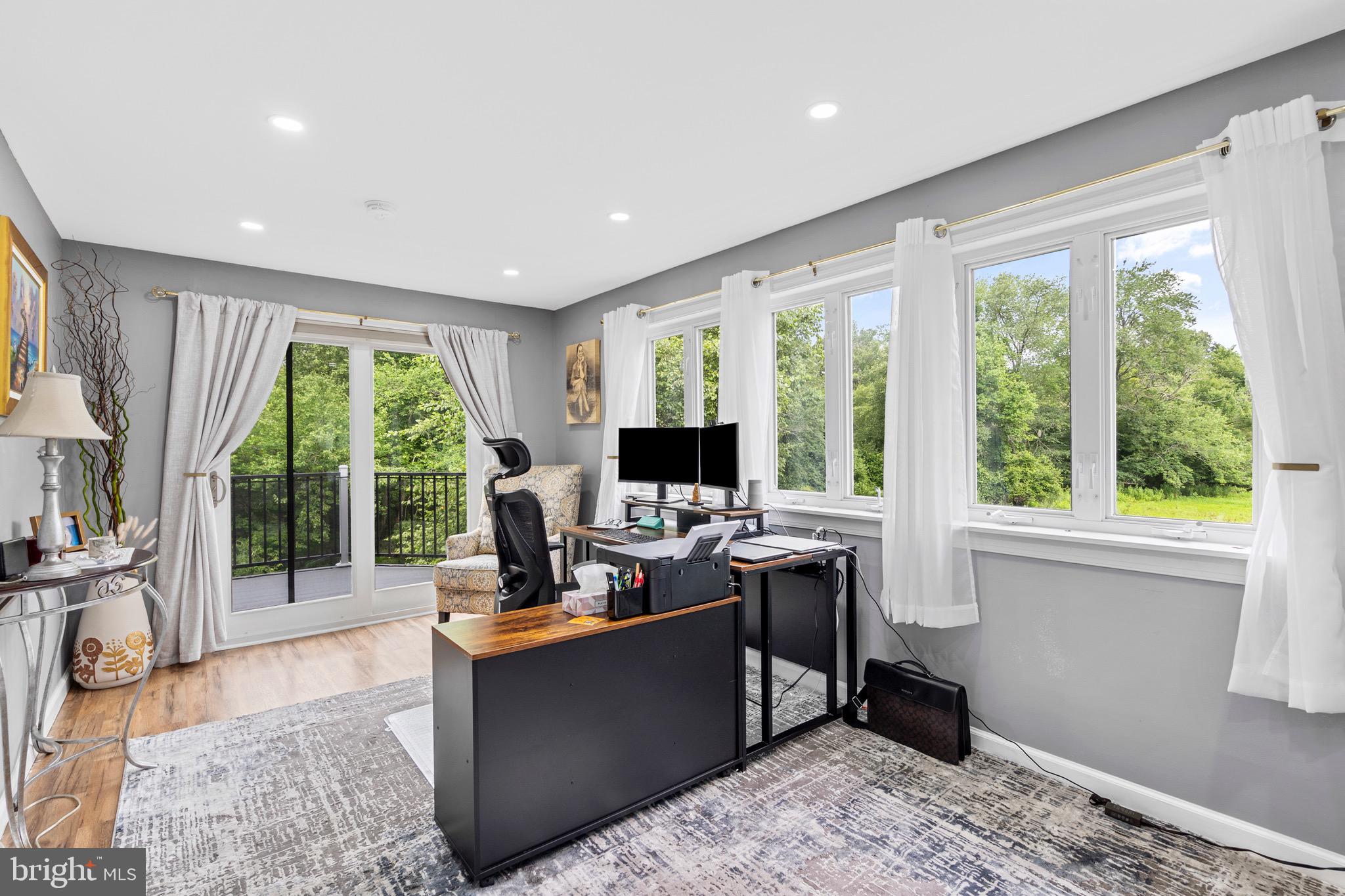 6 Kates Tract Mount Holly, NJ 08060 - Photo 22 of 36 a living room with furniture large windows and wooden floor