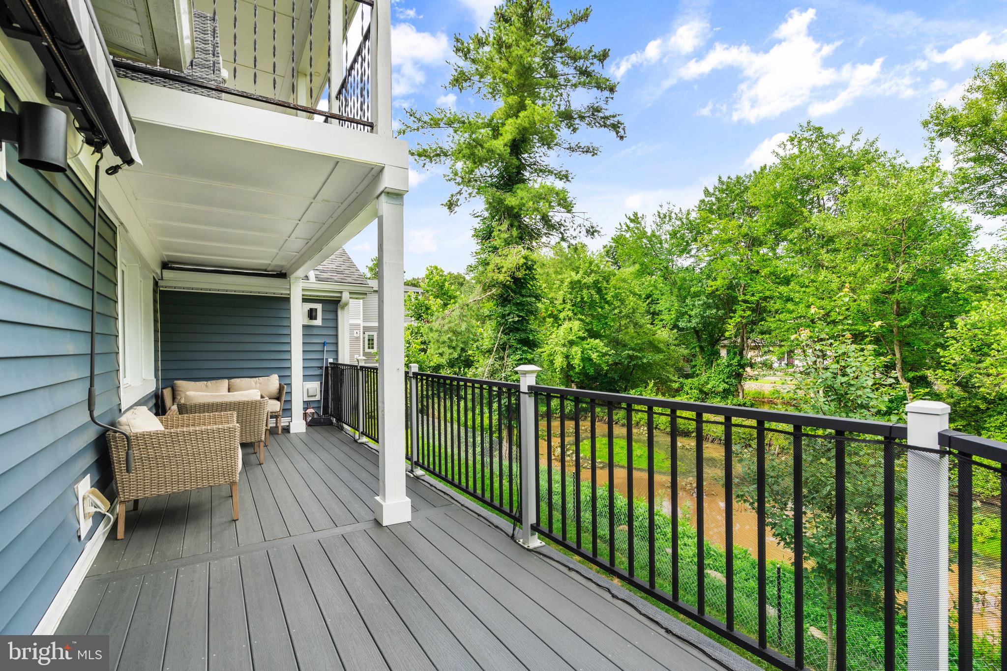 6 Kates Tract Mount Holly, NJ 08060 - Photo 29 of 36 a view of a balcony with two chairs and wooden floor