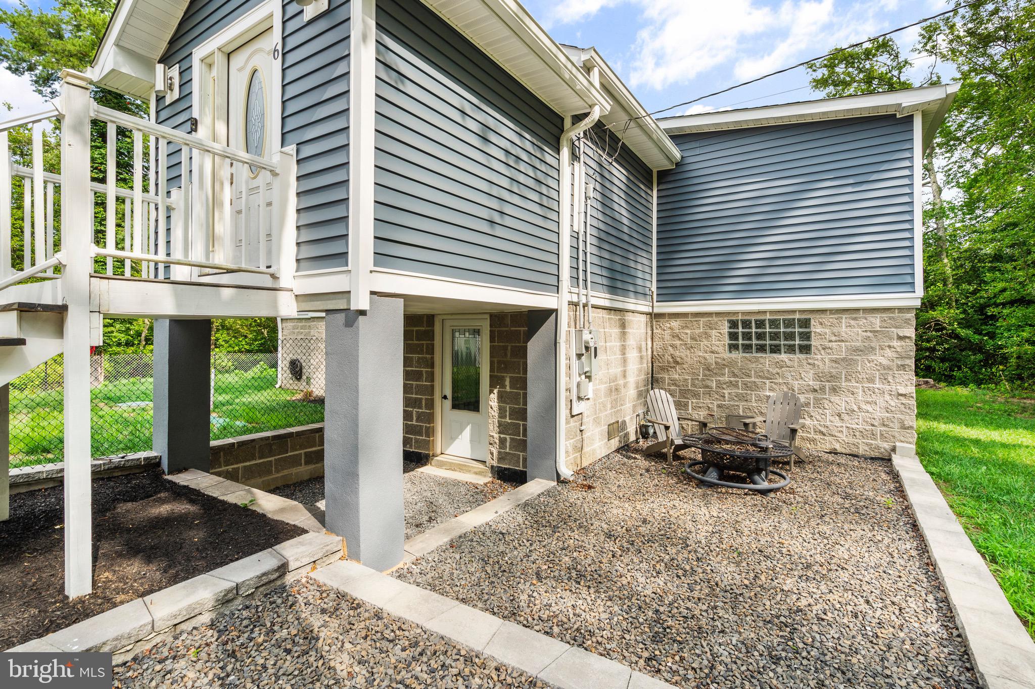 6 Kates Tract Mount Holly, NJ 08060 - Photo 3 of 36 a view of a house with a large window and brick walls