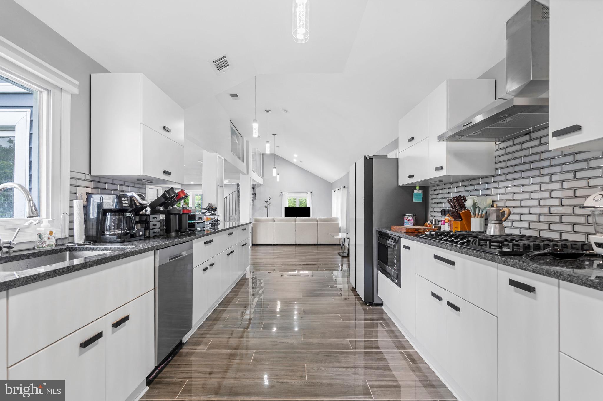 6 Kates Tract Mount Holly, NJ 08060 - Photo 8 of 36 a large white kitchen with lots of counter space and a sink