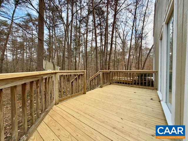 93 West Cedar Drive Ruckersville, VA 22968 - Photo 17 of 29 a view of balcony with wooden floor and fence