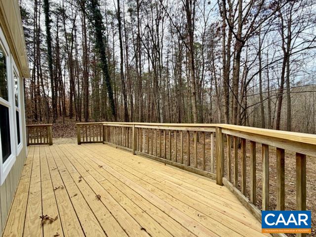 93 West Cedar Drive Ruckersville, VA 22968 - Photo 18 of 29 a view of balcony with wooden floor and fence