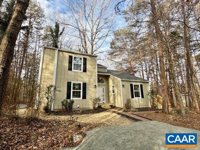 93 West Cedar Drive Ruckersville, VA 22968 - Photo 28 of 29 a front view of a house with a yard