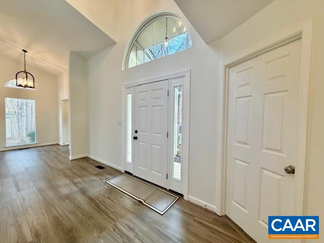 93 West Cedar Drive Ruckersville, VA 22968 - Photo 3 of 29 a view of an entryway with wooden floor