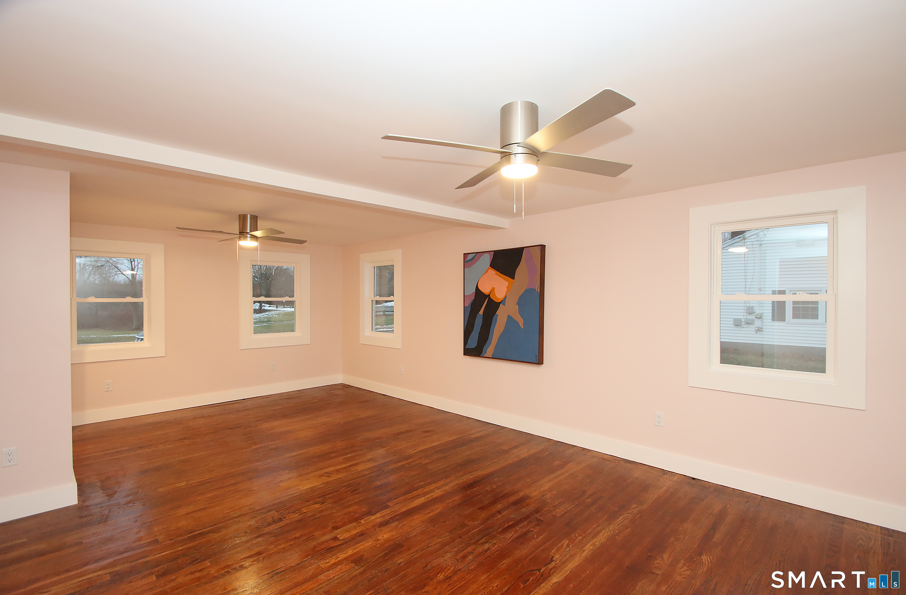 93 Overlook Road Meriden, CT 06450 - Photo 16 of 33 a view of a big room with wooden floor and windows