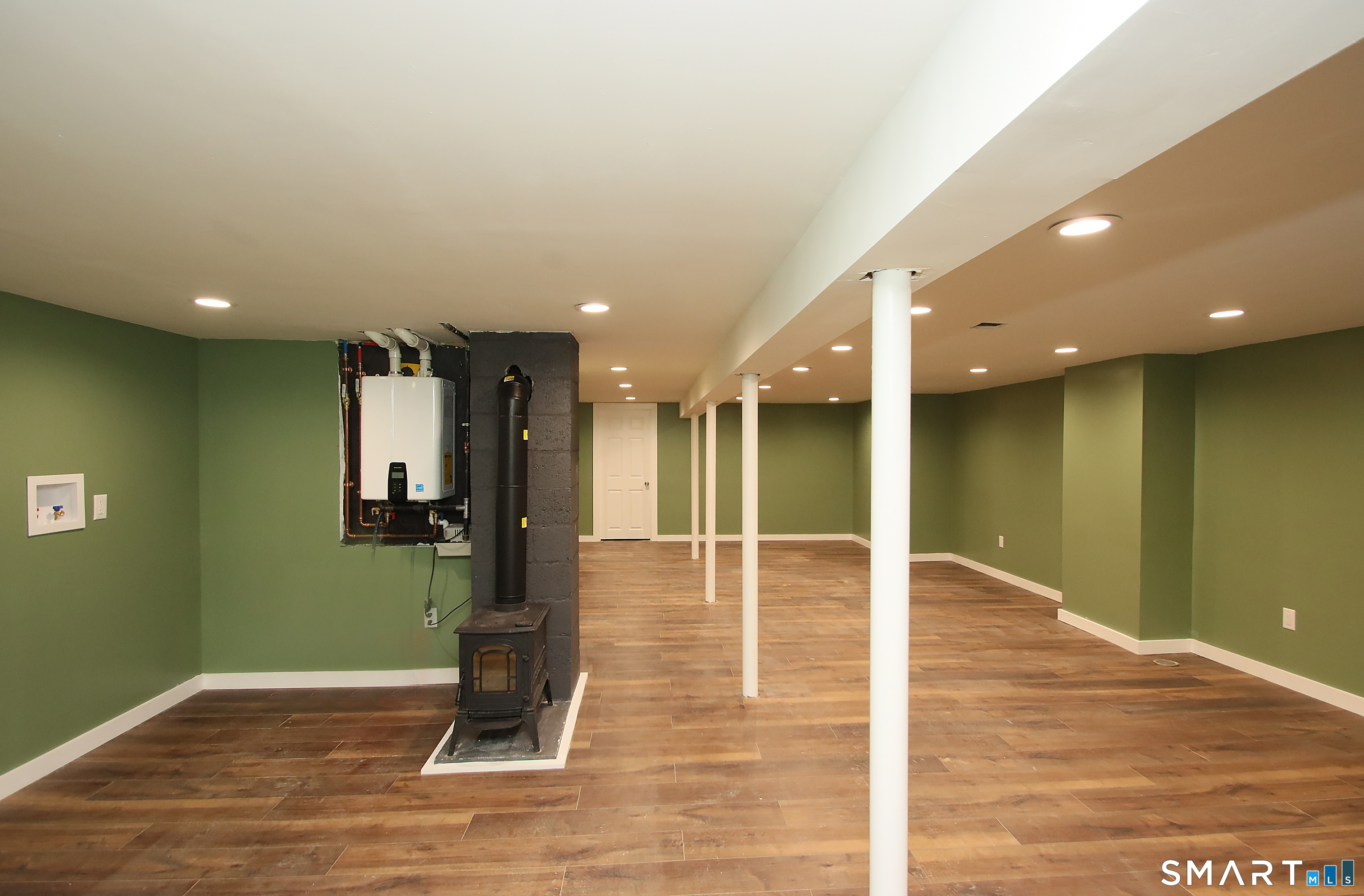 93 Overlook Road Meriden, CT 06450 - Photo 31 of 33 a view of a hall with lots of wooden floor