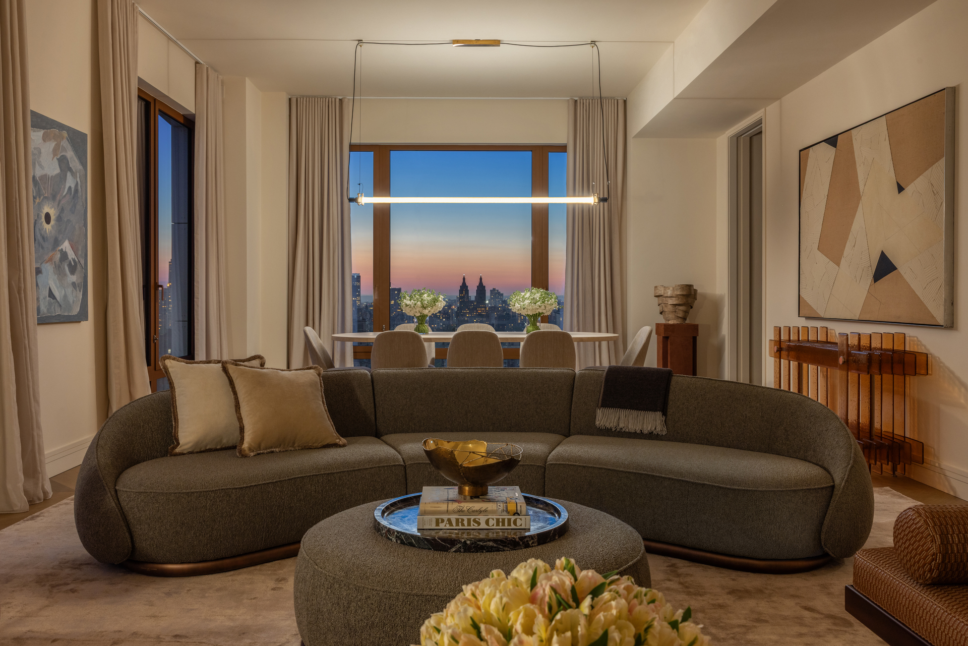 201 East 74th Street, Unit 30 Manhattan, NY 10021 - Photo 2 of 28 a living room with furniture or couch and a window