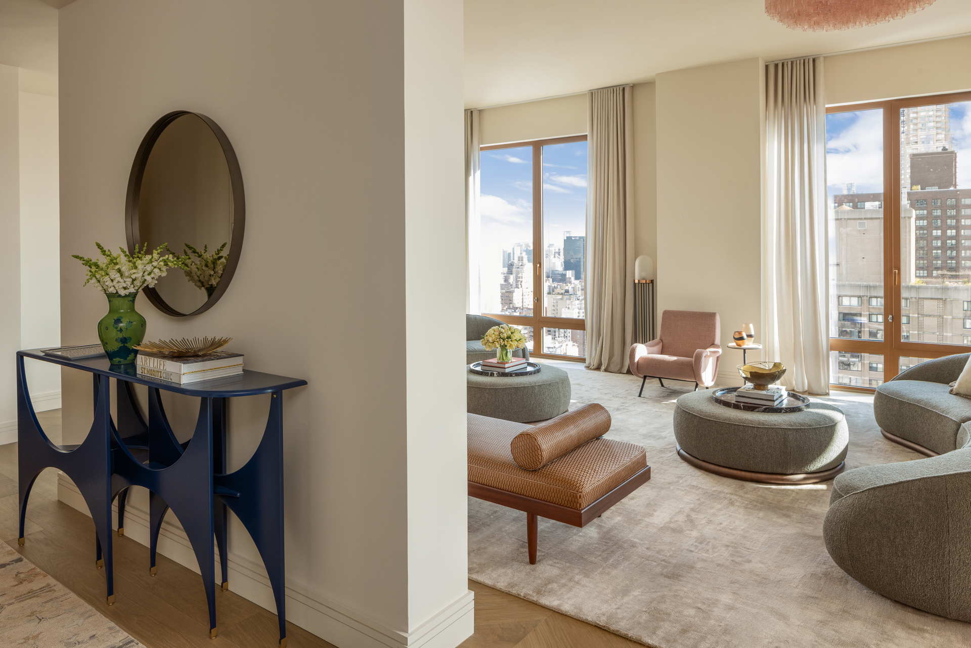 201 East 74th Street, Unit 30 Manhattan, NY 10021 - Photo 3 of 28 a living room with furniture and a large window
