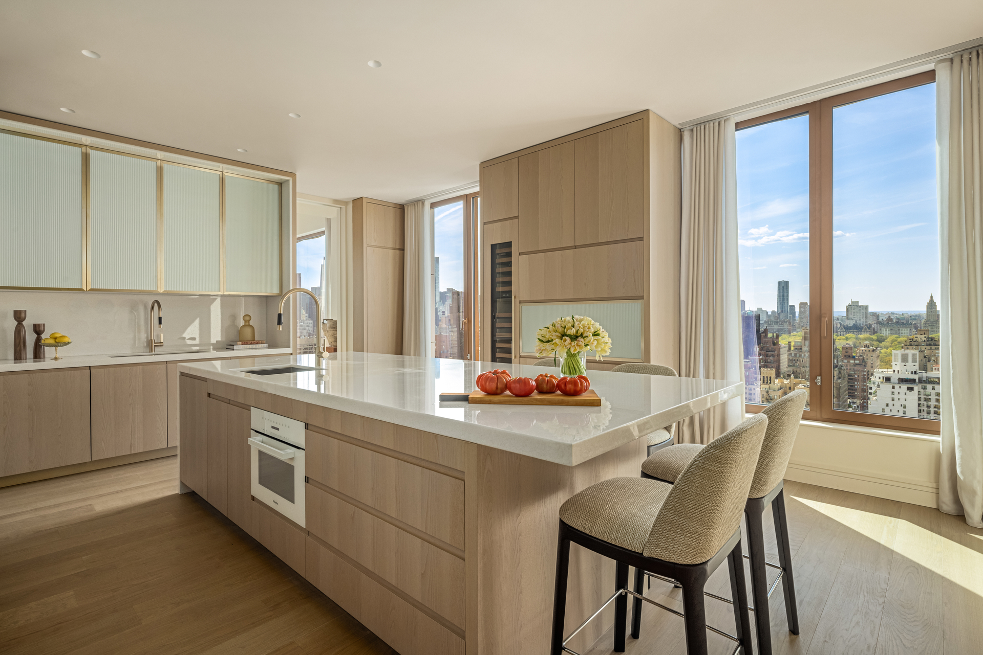 201 East 74th Street, Unit 30 Manhattan, NY 10021 - Photo 5 of 28 a kitchen with a sink cabinets and wooden floor
