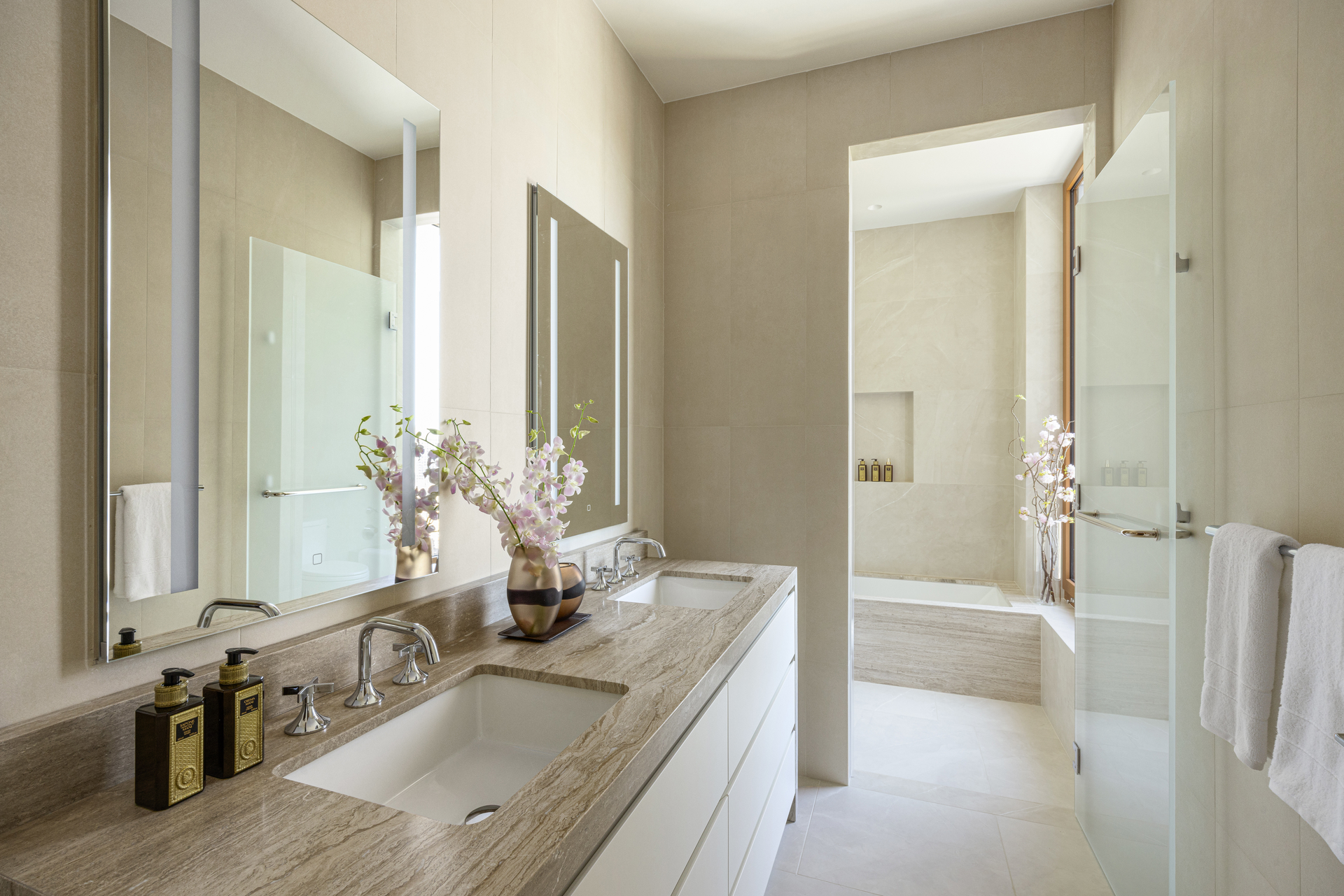 201 East 74th Street, Unit 30 Manhattan, NY 10021 - Photo 9 of 28 a bathroom with a tub sink and mirror