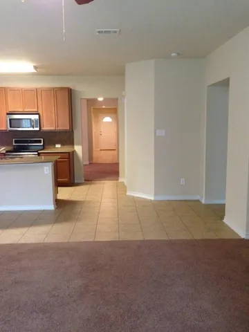 a view of kitchen with a sink