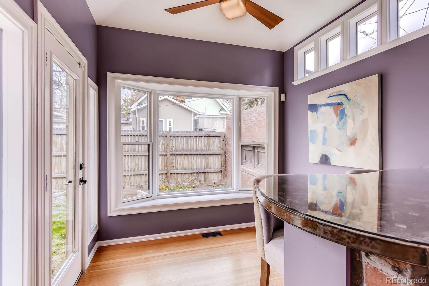 2030 Park Place Denver, CO 80205 - Photo 12 of 28 a living room with a bed furniture and a window