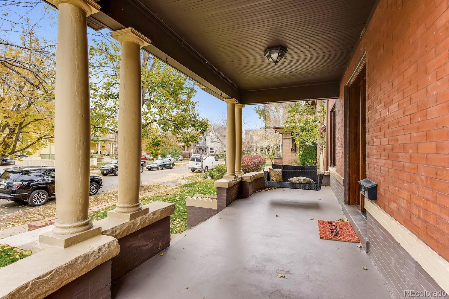 2030 Park Place Denver, CO 80205 - Photo 4 of 28 a living room with furniture and a large window