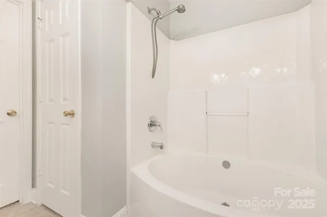 a bathroom with a bathtub