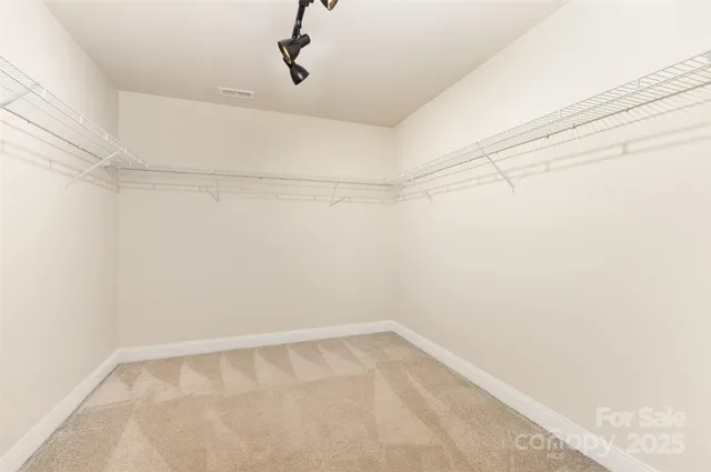 a view of a room with racks on the wall