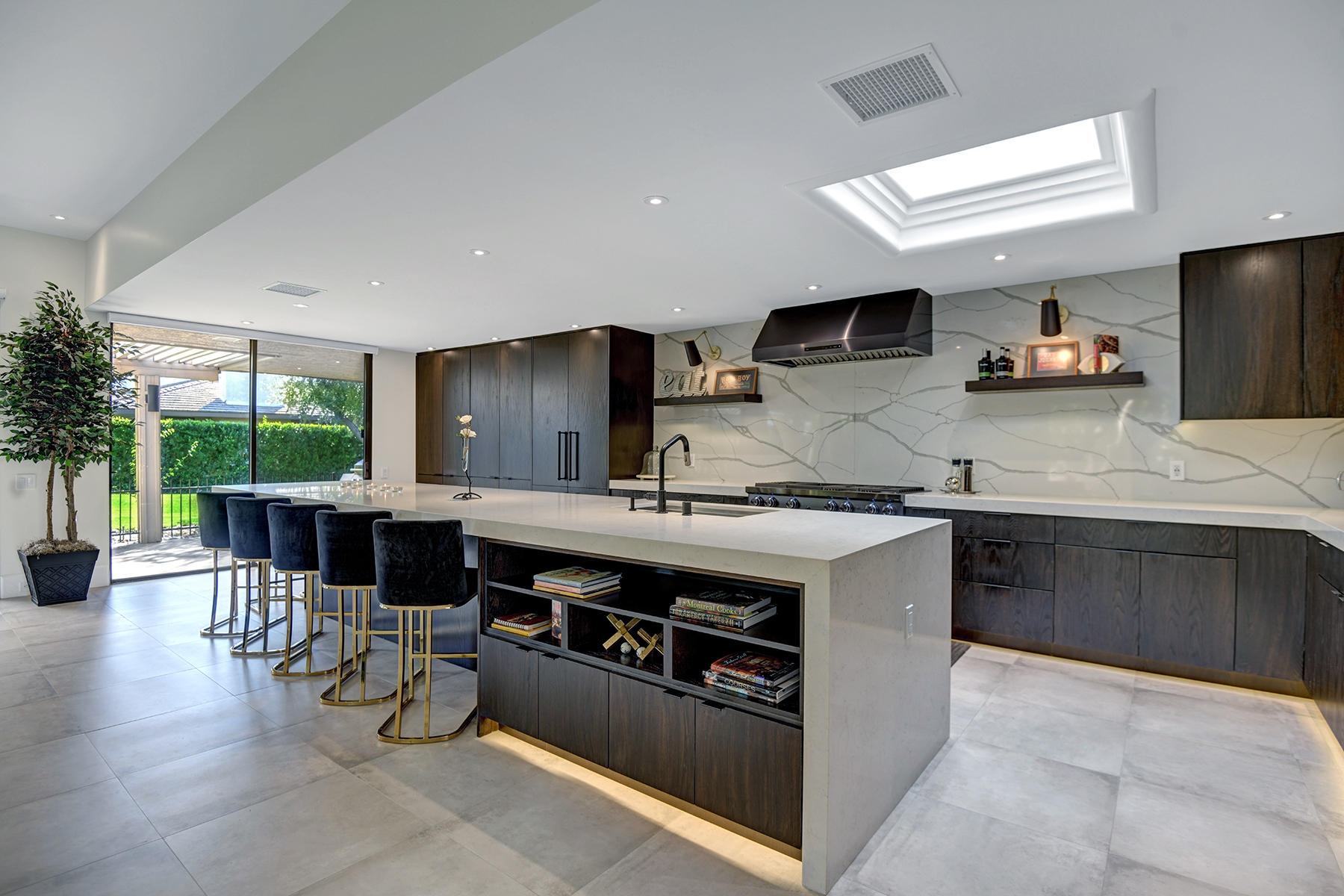 13 Rutgers Court Rancho Mirage, CA 92270 - Photo 1 of 42 a kitchen with a stove a sink and a refrigerator