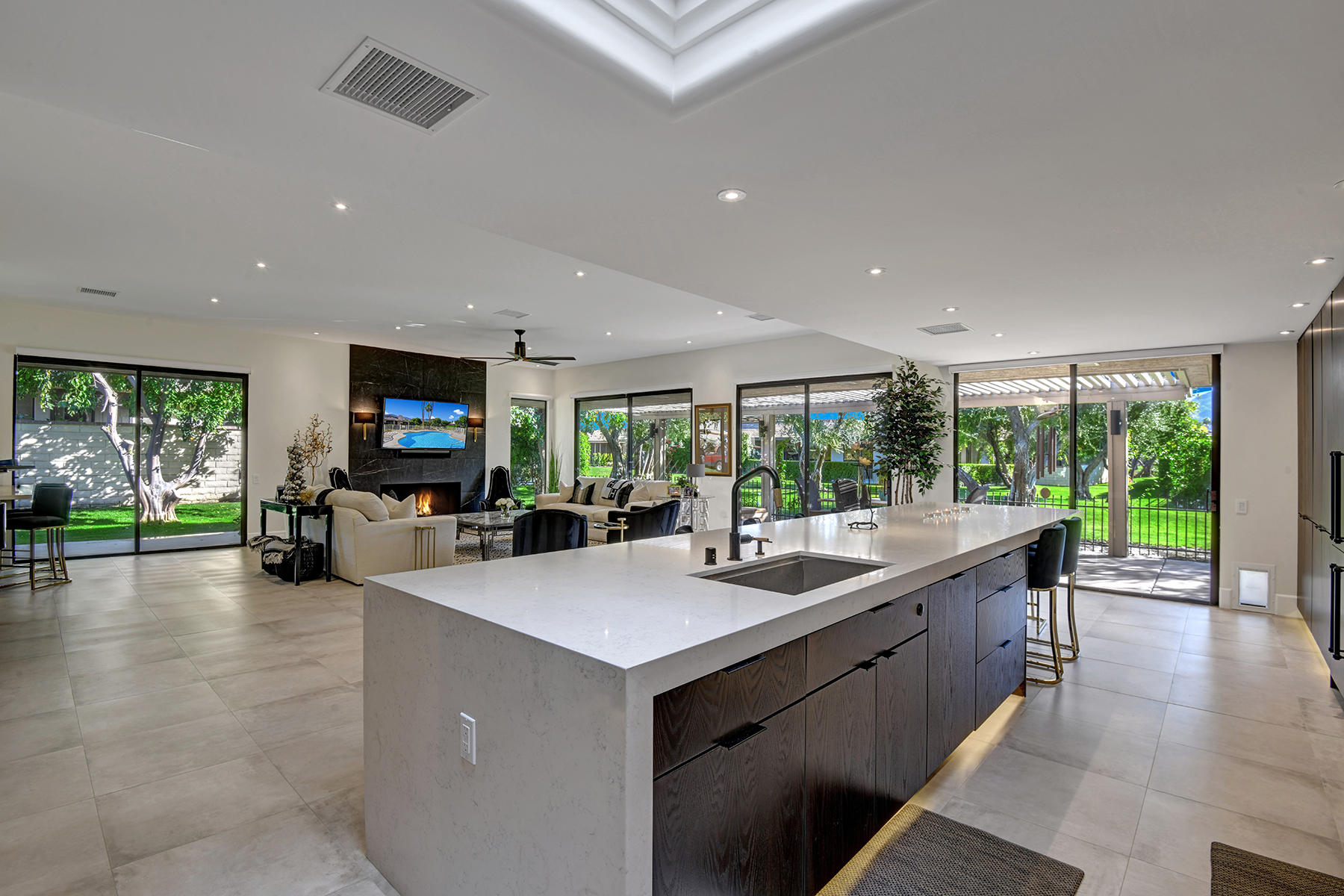 13 Rutgers Court Rancho Mirage, CA 92270 - Photo 12 of 42 a view of kitchen with dining table and chairs