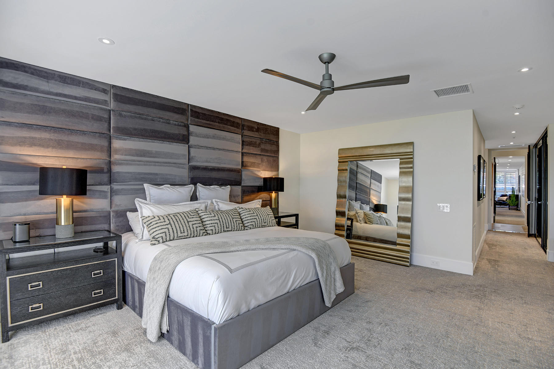 13 Rutgers Court Rancho Mirage, CA 92270 - Photo 26 of 42 a bedroom with a bed and ceiling fan