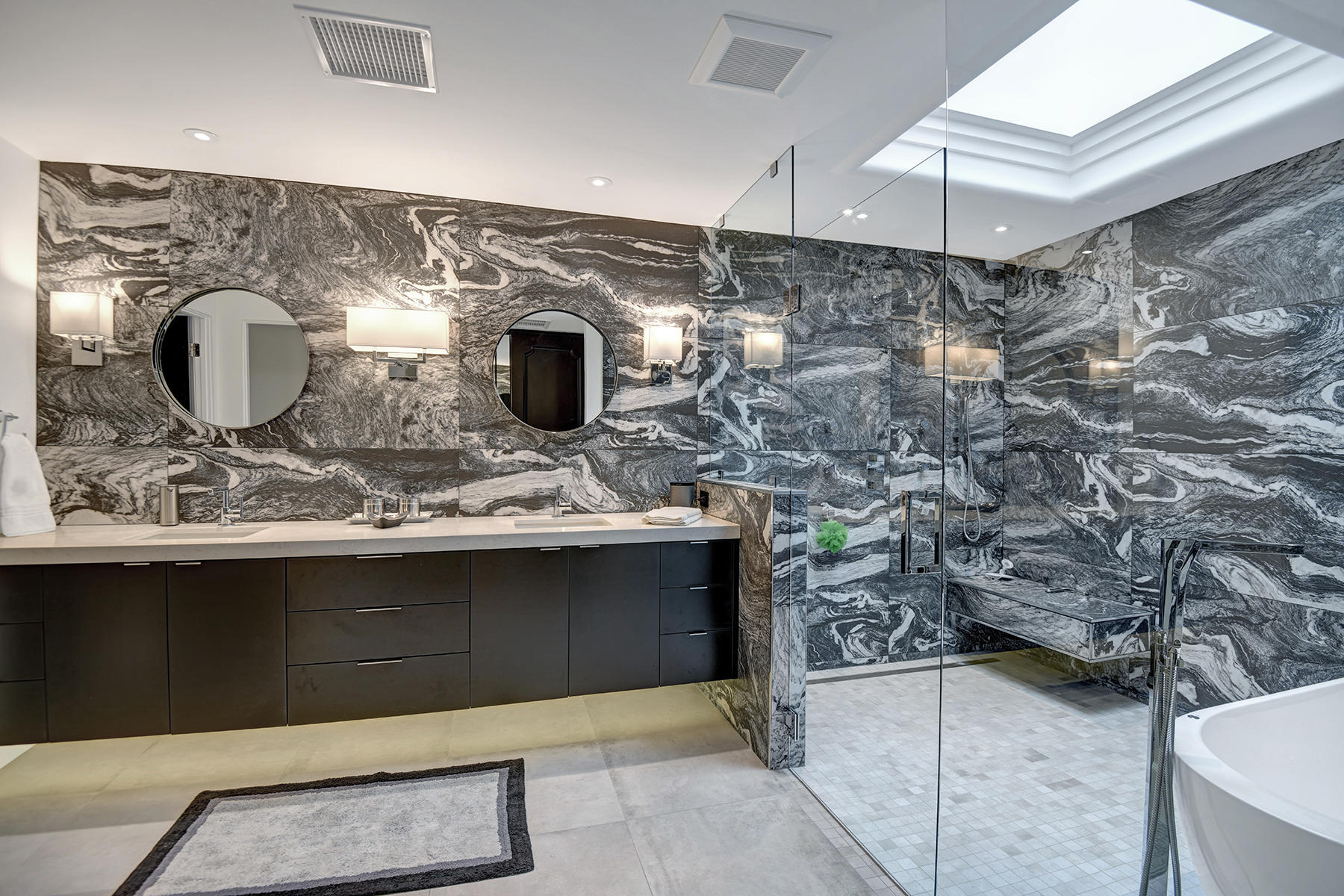 13 Rutgers Court Rancho Mirage, CA 92270 - Photo 29 of 42 a bathroom with a sink and a mirror