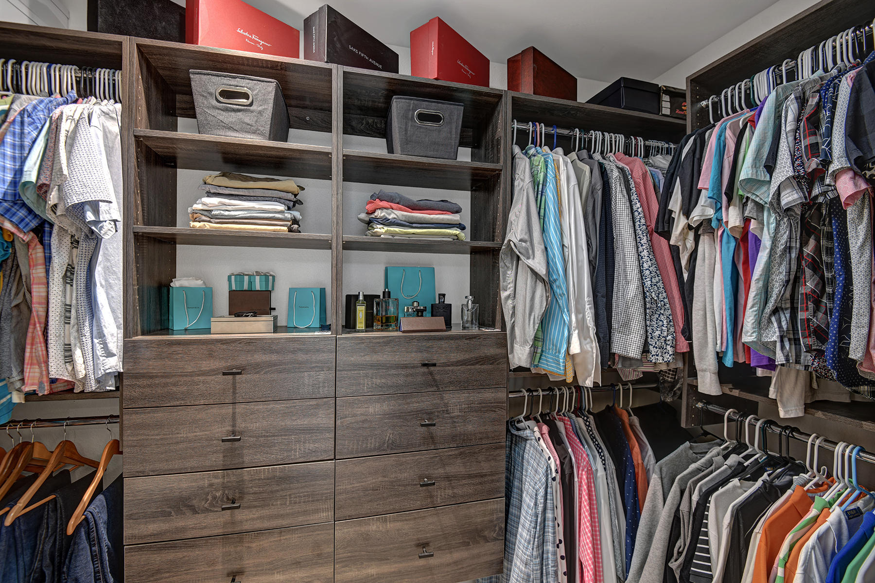 13 Rutgers Court Rancho Mirage, CA 92270 - Photo 32 of 42 a view of walk in closet with clothes and shoes