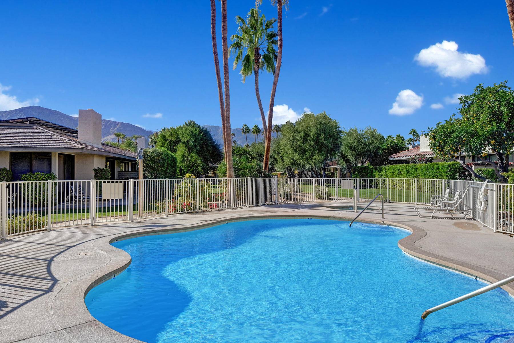13 Rutgers Court Rancho Mirage, CA 92270 - Photo 42 of 42 a view of a swimming pool with a patio