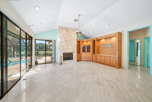 a bathroom with a tub and shower