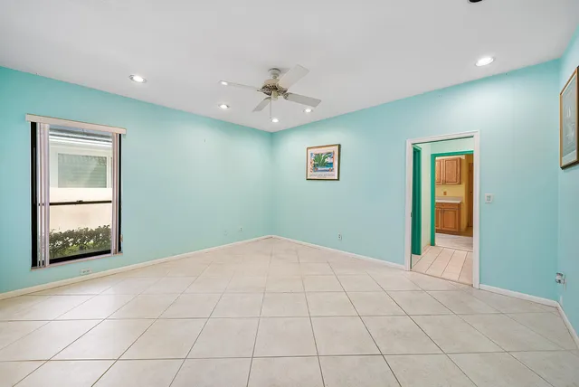 a view of a lake with houses in the back