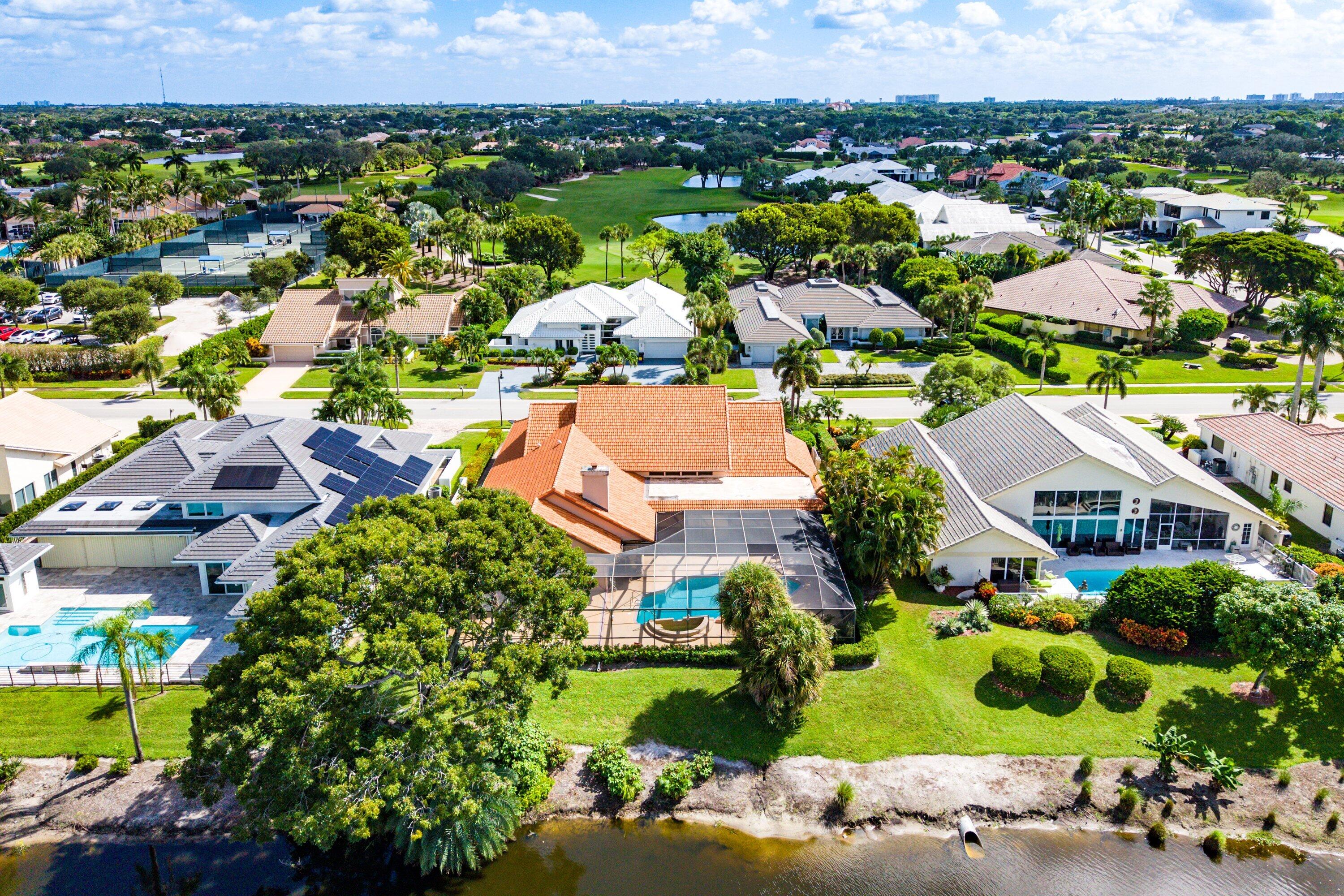 4952 Bocaire Boulevard Boca Raton, FL 33487 - Photo 39 of 61 an aerial view of residential houses with outdoor space