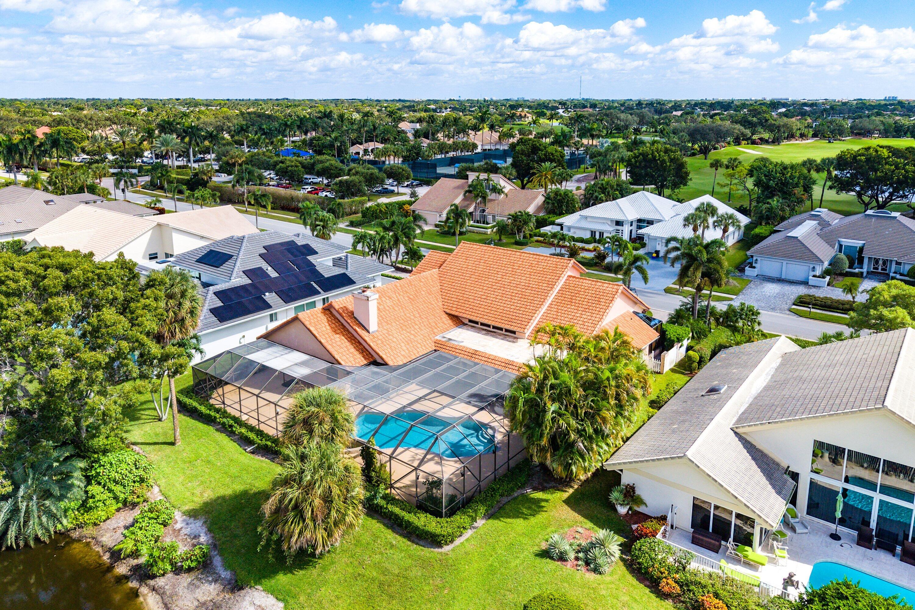4952 Bocaire Boulevard Boca Raton, FL 33487 - Photo 40 of 61 an aerial view of residential houses with outdoor space and swimming pool