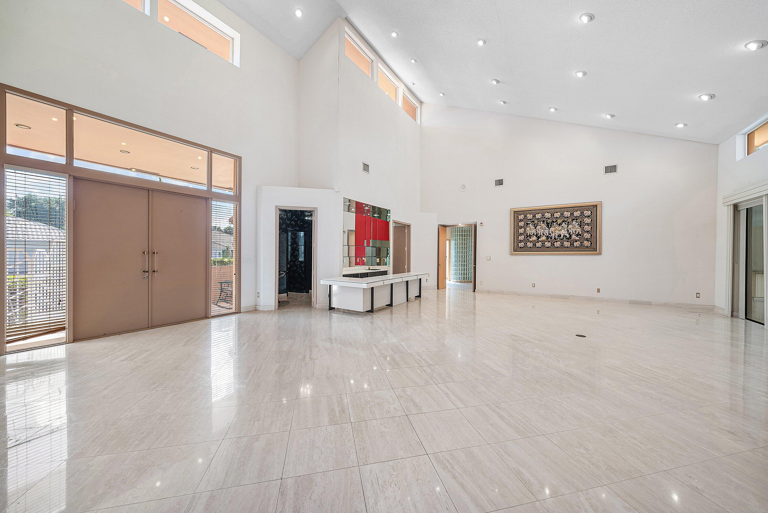4952 Bocaire Boulevard Boca Raton, FL 33487 - Photo 5 of 61 a view of a hallway with stairs