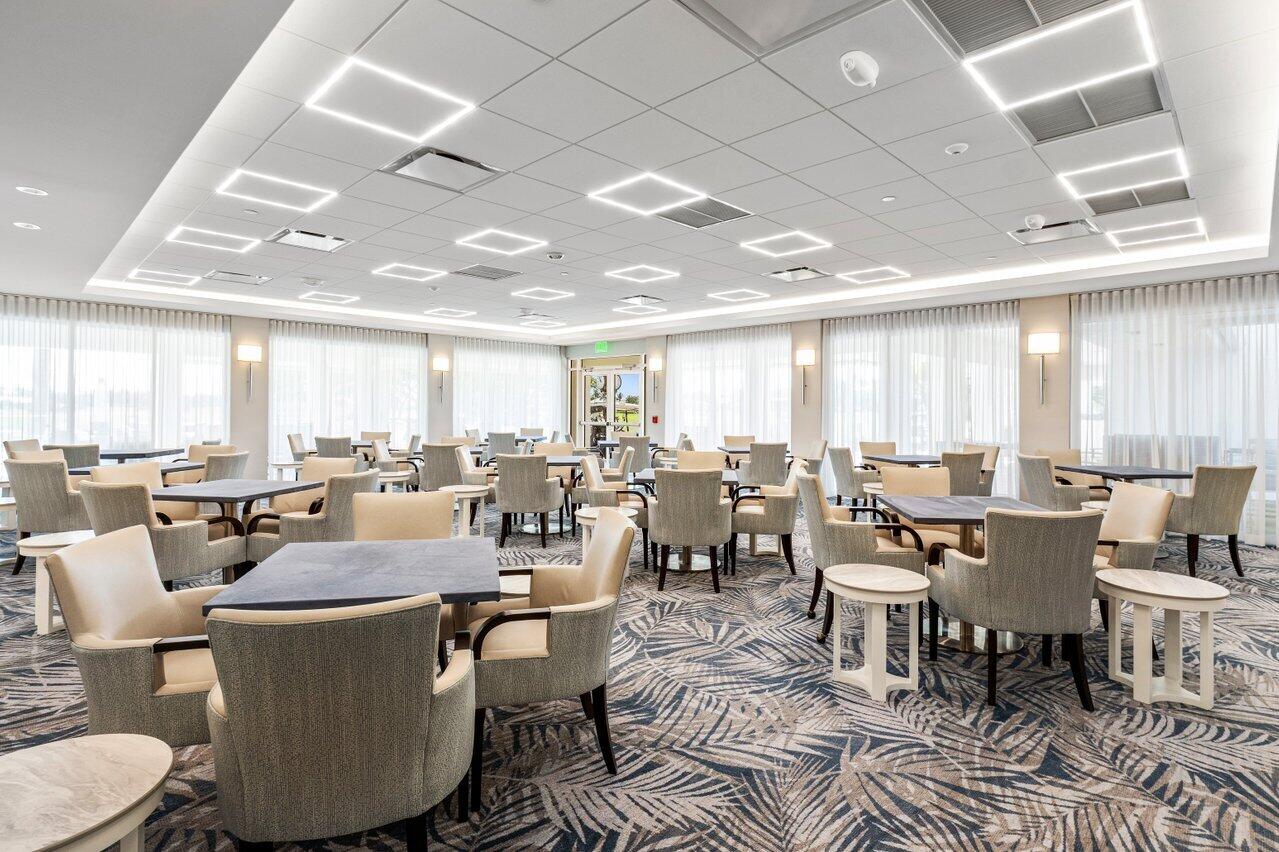 4952 Bocaire Boulevard Boca Raton, FL 33487 - Photo 54 of 61 a dining room with lots of tables a large window and chairs
